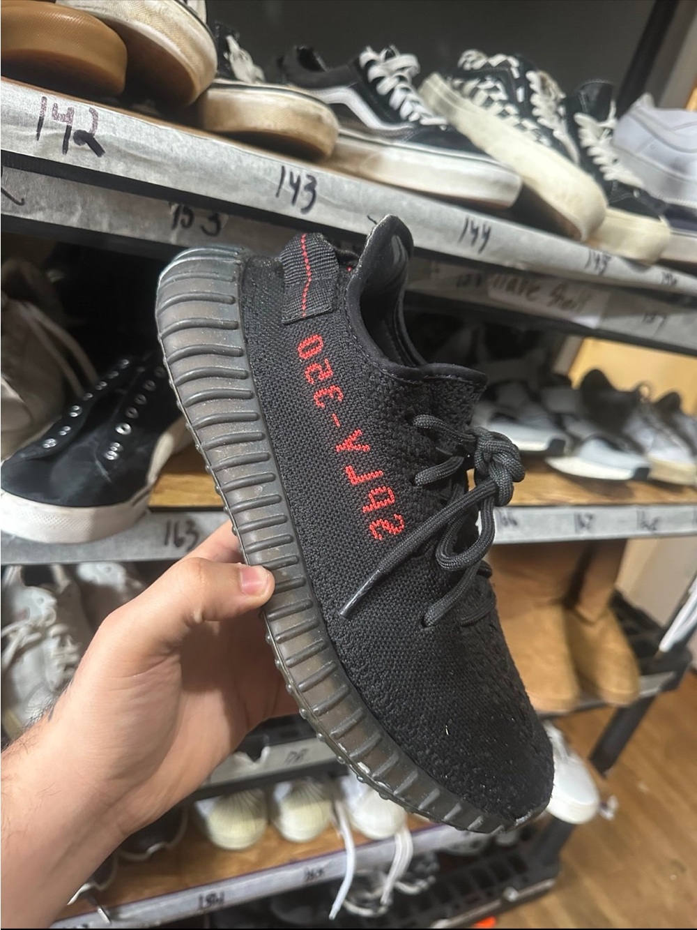 Black Knit Sneaker with Red Side Stripe Text